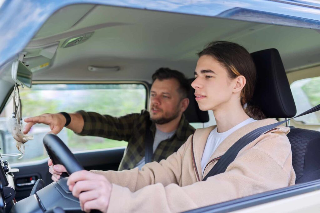 Father Teaching His Teenage Son To Drive 2021 12 09 17 11 02 Utc.jpg